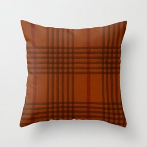 orange and brown weave pillow
